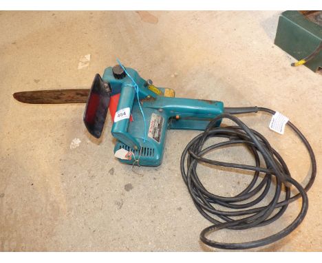 A "Makita" 240 volt Chainsaw.