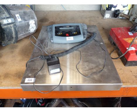 An electric weighing scales.