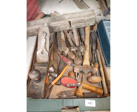 An assortment of tools, "Stanley" long plane, hammers and wood working tools.