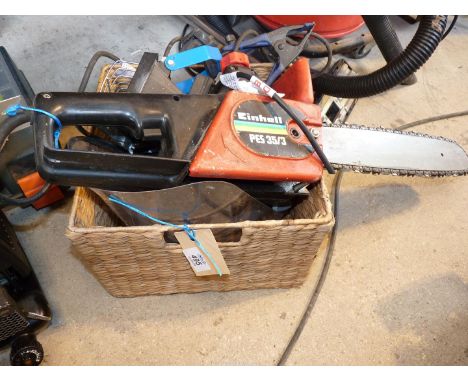 An "Einhell" 240 volt electric Chainsaw (not working) plus face mask, ear defenders, 240 volt lamp, etc.,