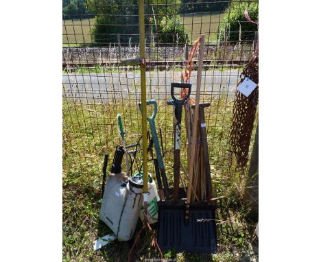 A quantity of tools to include garden sprayers, hoes, forks, etc.