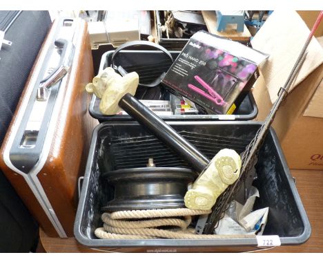 Head phones, a bear paper towel holder, a combination briefcase, etc.,