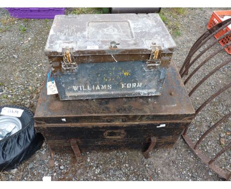 A metal trunk and a case.