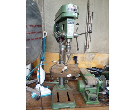 A pillar drill (12 speed), as seen.   