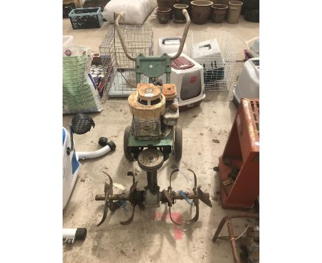 A ROTOVATOR WITH  A BRIGGS AND STRATTON ENGINE 