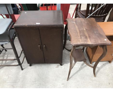 AN OAK CABINET WITH TWO DOORS AND A MAHOGANY SIDE TABLE WITH LOWER SHELF 