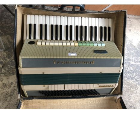 A RETRO CASED 'TRANSICHORD' ACCORDION 