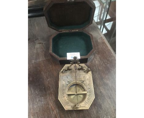 A BOXED COX LONDON BRASS SUNDIAL AND COMPASS 