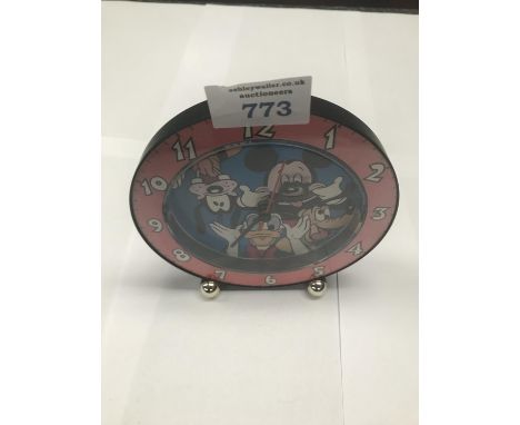 A VINTAGE MICKEY MOUSE CLOCK IN WORKING ORDER 