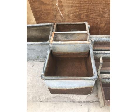 A VINTAGE GALVANISED WATER TROUGH WITH SOME RUST DAMAGE APPROX 3FT LONG 