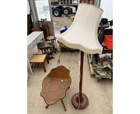 AN ITALIAN STYLE COFFEE TABLE AND STANDARD LAMP COMPLETE WITH SHADE 