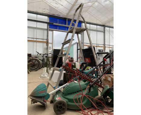 AN ASSORTMENT OF ITEMS TO INCLUDE A FOUR RUNG ALUMINIUM STEP LADDER, A QUALCAST MOWER AND A HEDGE TRIMMER ETC 