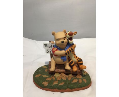 A DISNEY POOH AND FRIENDS CERAMIC FIGURE 'FALL COLORS CHARM US AS LEAVES BLOW' LIMITED EDITION 5909/7500 