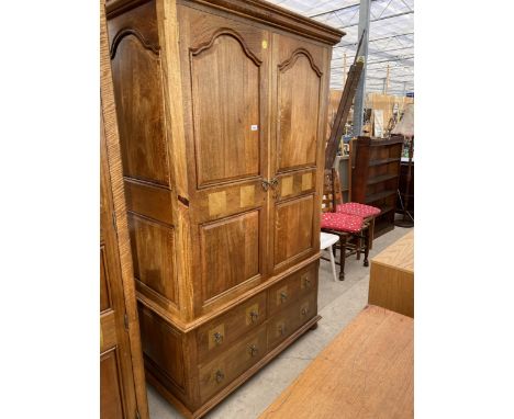 A MODERN HARDWOOD TWO DOOR WARDROBE WITH INSET MARBLE, FOUR DRAWERS TO BASE, HAVING LOOP AND STARBURST HANDLES, 48" WIDE 