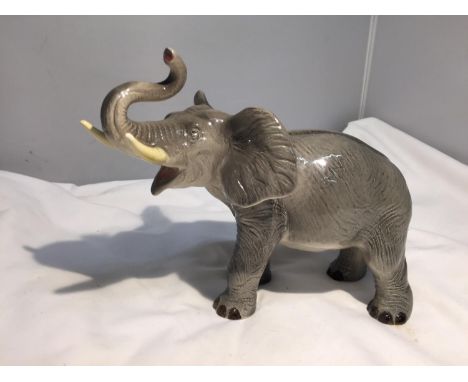 A CERAMIC ELEPHANT 