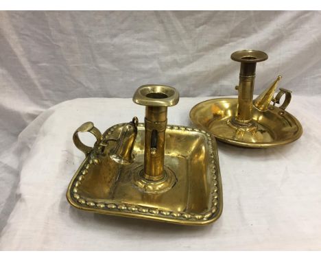 TWO LARGE HEAVY VINTAGE BRASS CANDLESTICK HOLDERS WITH PUSH UP MECHANISM AND SNUFFER 