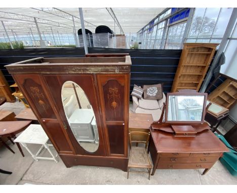 AN EDWARDIAN MAHOGANY AND INLAID MIRROR-DOOR WARDROBE AND DRESSING CHEST COMPLETE WITH UNRELATED BEDROOM CHAIR 