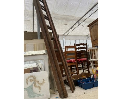 A VINTAGE WOODEN 16 RUNG EXTENDABLE LADDER AND A LONG REACH LOPPER 