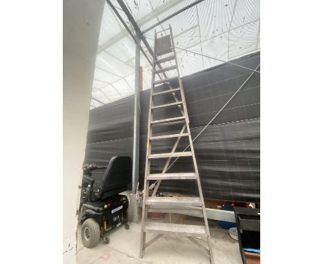 A LARGE ELEVEN RUNG ALUMINIUM STEP LADDER