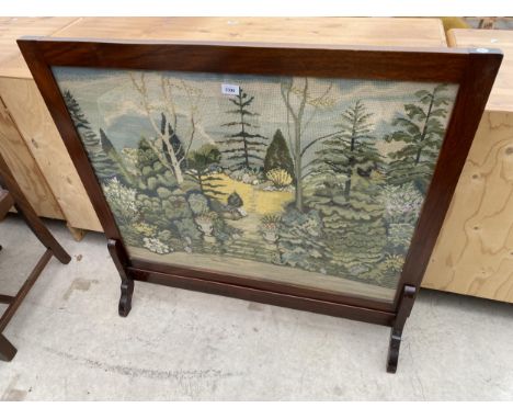 AN EDWARDIAN TAPESTRY FIRESCREEN, 39 X 34" DEPICTING A GARDEN SCENE 