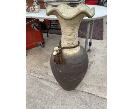 A LARGE CERAMIC VASE/ STICK STAND 