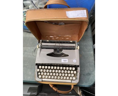 A RETRO CASED BROTHER TYPEWRITER 