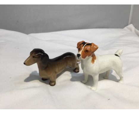 TWO CERAMIC FIGURES, ONE A BESWICK ENGLAND JACK RUSSELL AND THE SECOND A W.R MIDWINTER DASCHUND DOG WITH REPAIR TO THE TAIL 