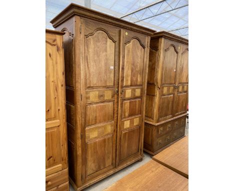 A MODERN HARDWOOD PANELLED TWO DOOR WARDROBE WITH INSET MARBLE HAVING LOOP AND STARBURST HANDLES, 48" WIDE 