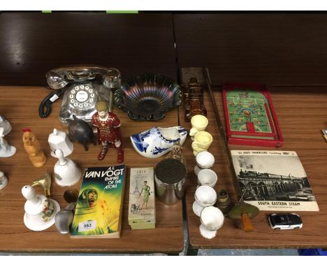 A QUANTITY OF COLLECTABLES TO INCLUDE EGG CUPS, TELEPHONE, CERAMIC BELLS, CARNIVALWARE GLASS DISH, NOVELTY CORKSCREW, CERAMIC