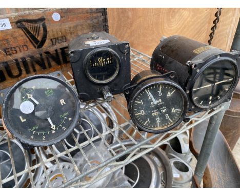 AN ASSORTMENT OF VINTAGE AVIATION INSTRUMENTS - A TURN AND SLIP INDICATOR, COMPASS, RATE OF CLIMB INDICATOR AMD AN ARTIFICIAL