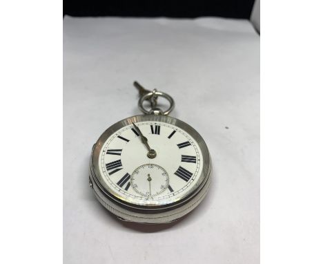 A HALLMARKED BIRMINGHAM SILVER POCKET WATCH WITH KEY SEEN WORKING BUT NO WARRANTY 