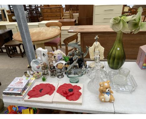 A LARGE ASSORTMENT OF GLASS AND CERAMIC WARE TO INCLUDE VASES, DOLPHINS AND WALL PLAQUES ETC 