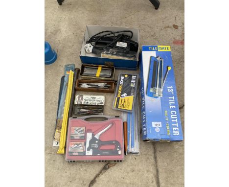 AN ASSORTMENT OF TOOLS TO INCLUDE AN ELECTRIC SANDER, DRILL BITS AND A TILE CUTTER ETC 