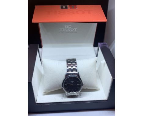 A BOXED TISSOT WRIST WATCH 