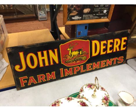 AN ENAMEL JOHN DEERE SIGN 90CM X 30CM 