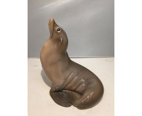 A LARGE ROYAL COPENHAGEN CERAMIC SEAL FIRE SIDE MODEL NUMBER 265 ? HEIGHT 28CM 