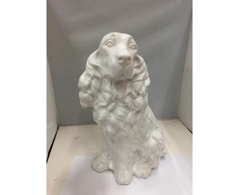 A LARGE WHITE CERAMIC SPANIEL 43CM TALL 