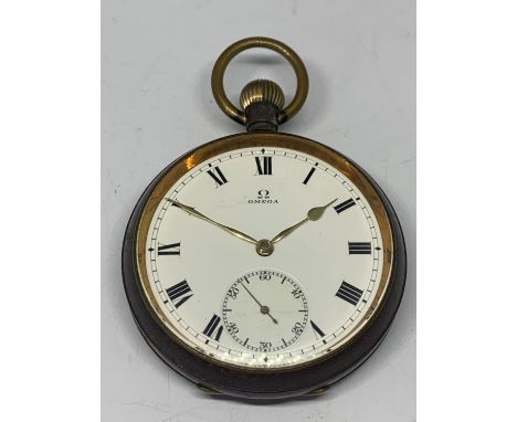 AN ANTIQUE GUN METAL OMEGA OPEN FACED POCKET WATCH 