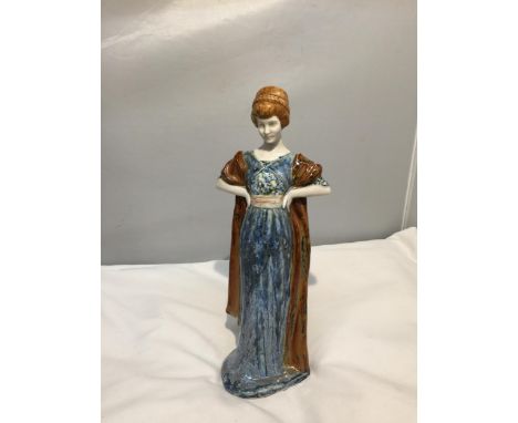 A FRENCH CERAMIC FIGURINE 