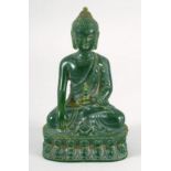 A THAI CARVED GREEN HARDSTONE BUDDHA. 13cm high.