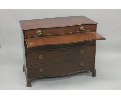 A RARE 18TH CENTURY AMERICAN SERPENTINE FRONT COMMODE, pine lined with a large oval to the top, long frieze drawer over a bru