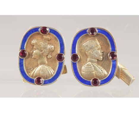 A PAIR OF RUSSIAN SILVER AND ENAMEL CUFFLINKS depicting the busts of a man and woman.