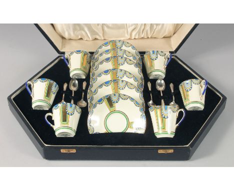 A SUPERB ADDERLEY WARE ART DECO PORCELAIN SET OF SIX CUPS AND SAUCERS, MADELINA, in a fitted case with 6 silver spoons.