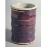 A CHINESE RIBBED SPECKLED BLUE BRUSH POT. 4.5ins high.