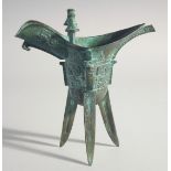 A CHINESE BRONZE EWER. 7.5ins high.