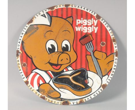 A NOVELTY CIRCULAR ENAMEL SIGN "Piggly Wiggly" 12ins diameter