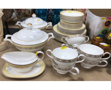 A Villeroy &amp; Boch "Heinrich" "Villa Cannes" dinner service, yellow banded with gilt foliate decoration, six place setting