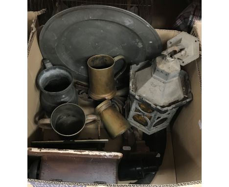 A collection of metal wares to include pewter charger, pewter measures, copper tankards, one with twin handles and stamped "J