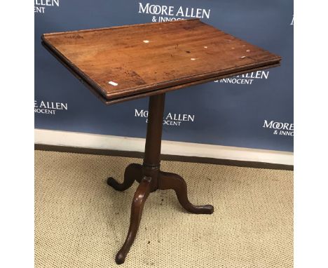 A Victorian mahogany reading table, the rectangular adjustable top on a telescopic turned pedestal base to tripod supports 65