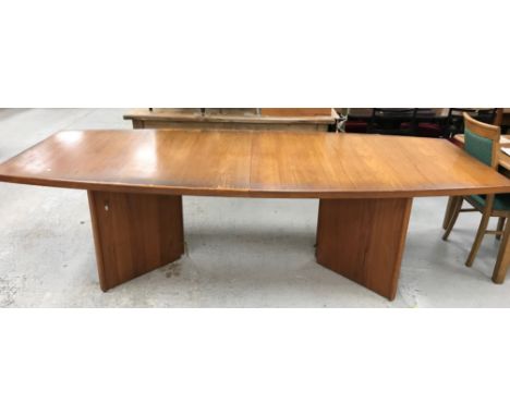 A d-Scan of Singapore teak boardroom table of shaped rectangular form on twin arrow head supports, bears makers label and sta